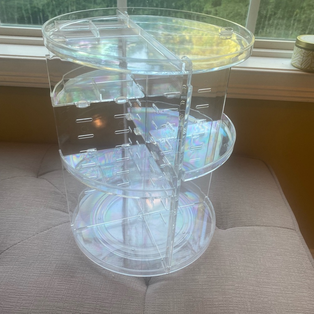 Clear swivel makeup stand
